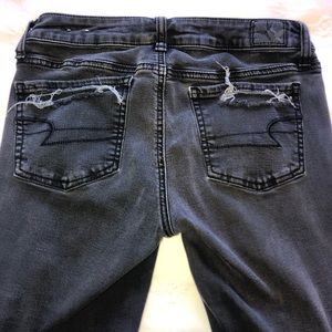 Black, ripped, stretchy jeans